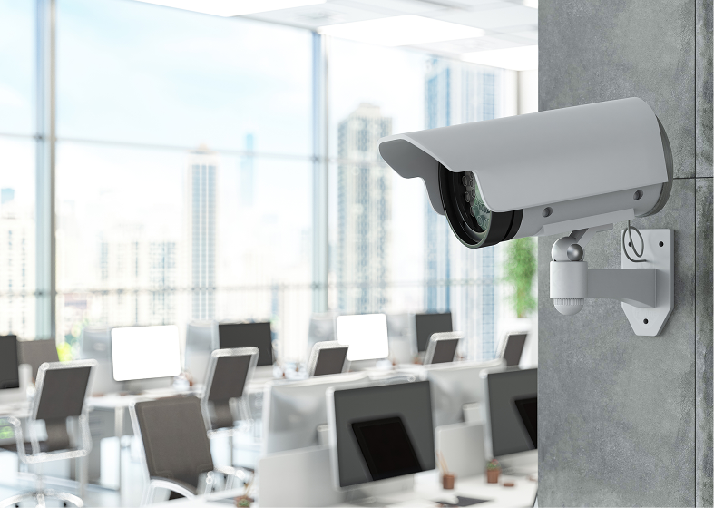 Indoor security camera overlooking desks