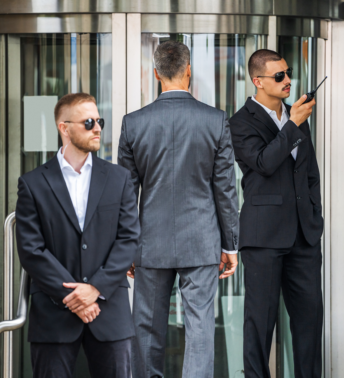 Guards monitoring with walkie-talkie